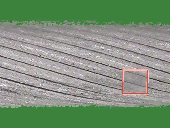Training crop with a drawn crushed patch: a flattened square region of strands, outlined in red.